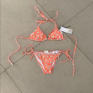 New with tags Roxy bikini, coral size small